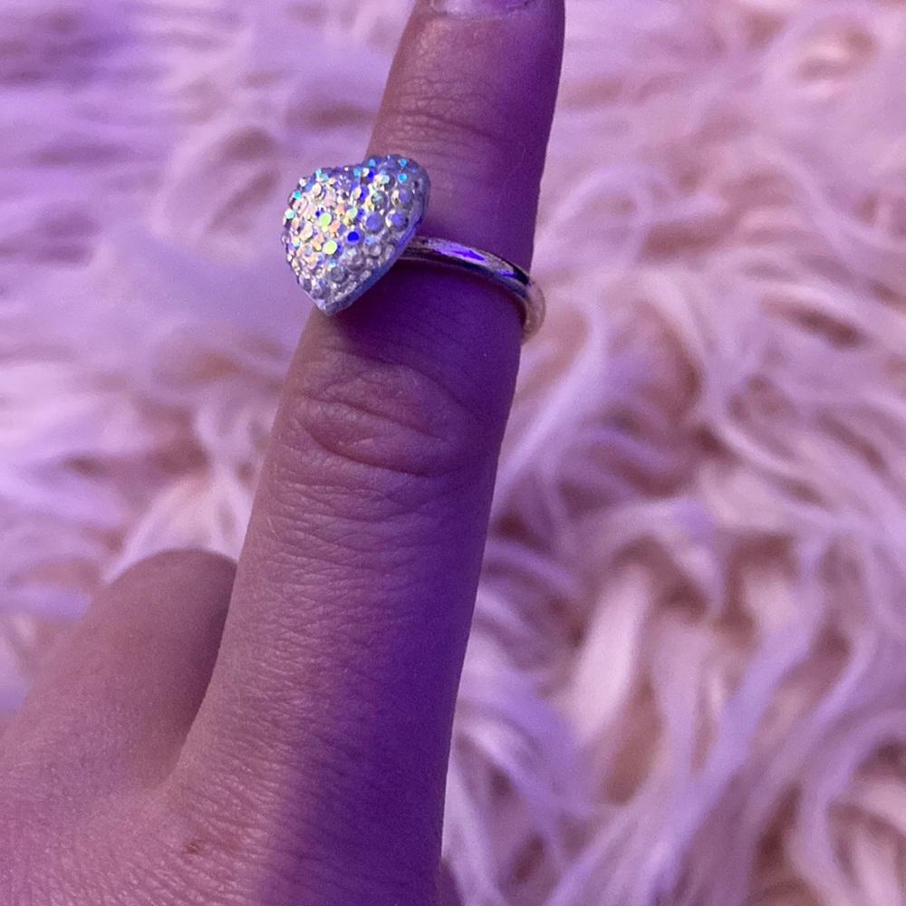 ring, fake diamonds, not sure what size.
